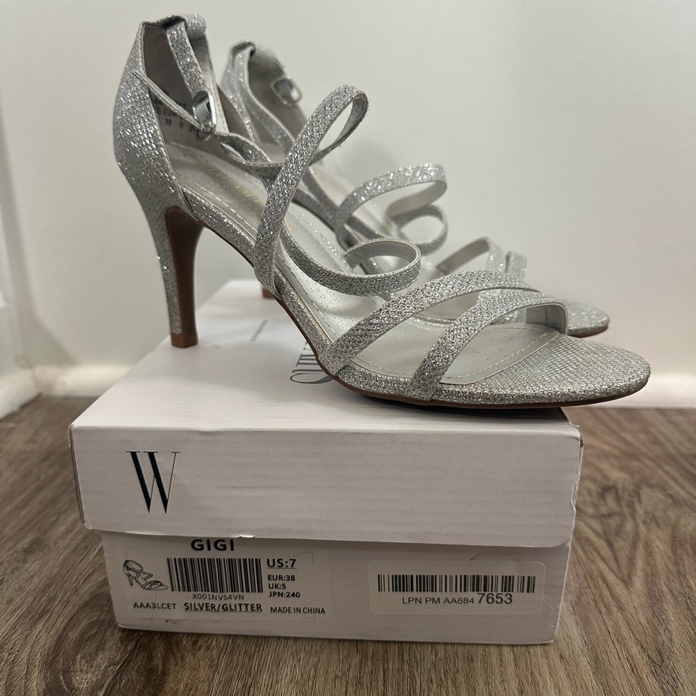 Women’s Silver Heels, size 7